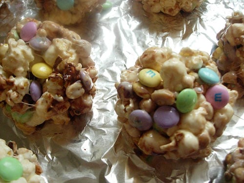 Popcorn-cake-on-foil Popcorn mix formed into balls on sheet of foil.