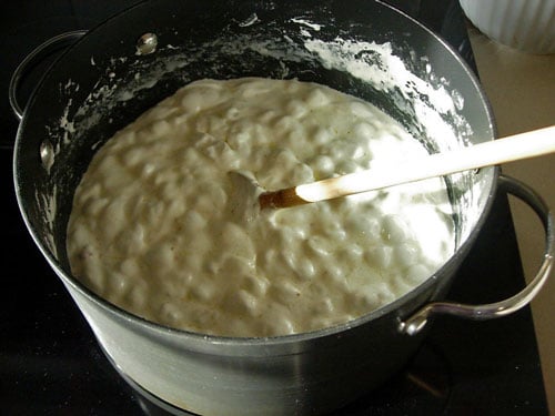 Popcorn-Cake-Marshmallow-Melting on stove Popcorn-Cake-Marshmallow-mixture melting in pot on stove
