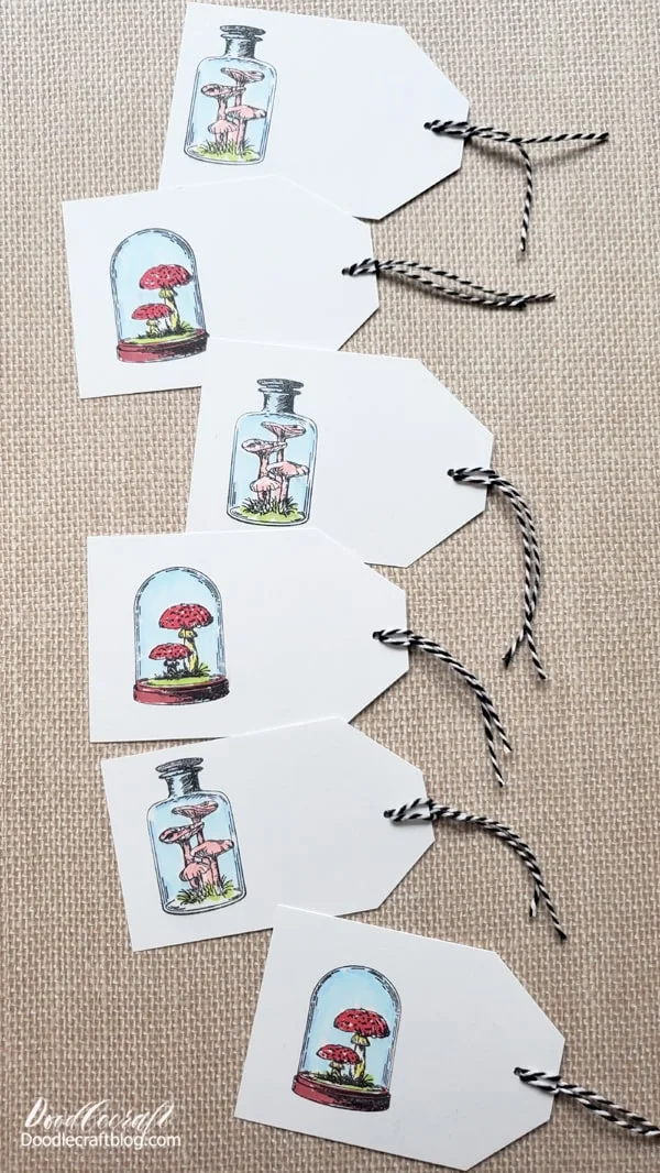 Christmas Gift Tags with ArtPOP Markers (Easy DIY) Supplies Needed for Mushroom Christmas Gift Tags: affiliate links artPOP! Infinity Brush Marker Sets (set of 24) Blick Studio Bristol Pads Mushroom Stamp Set Memento Black Ink Pad Black and White Bakers Twine Hole Punch Paper Cutter