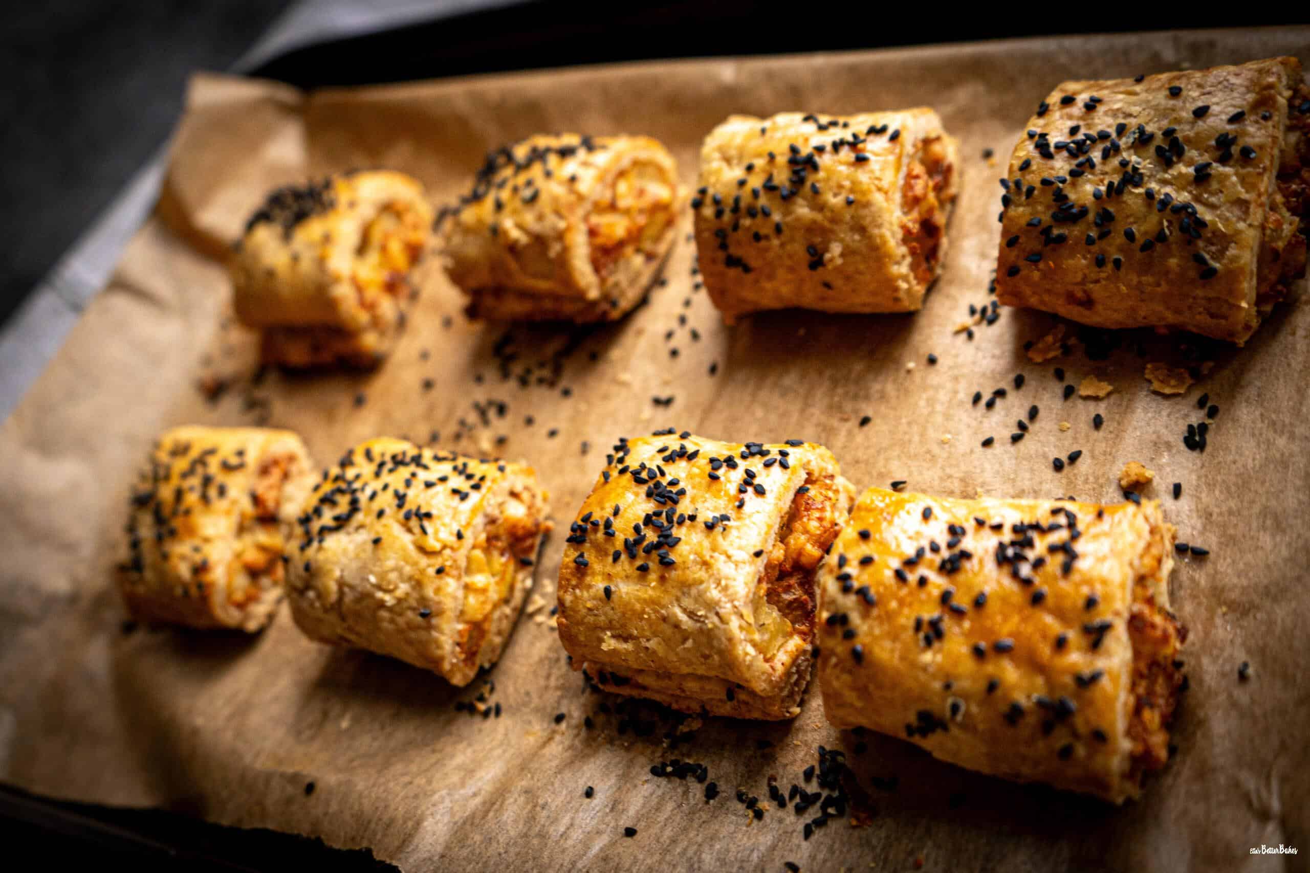 baked cheese and onion rolls on a baking sheet