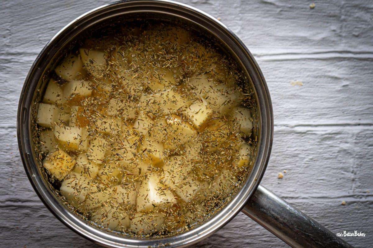 potatoes with dried thyme in a small saucepan full of water