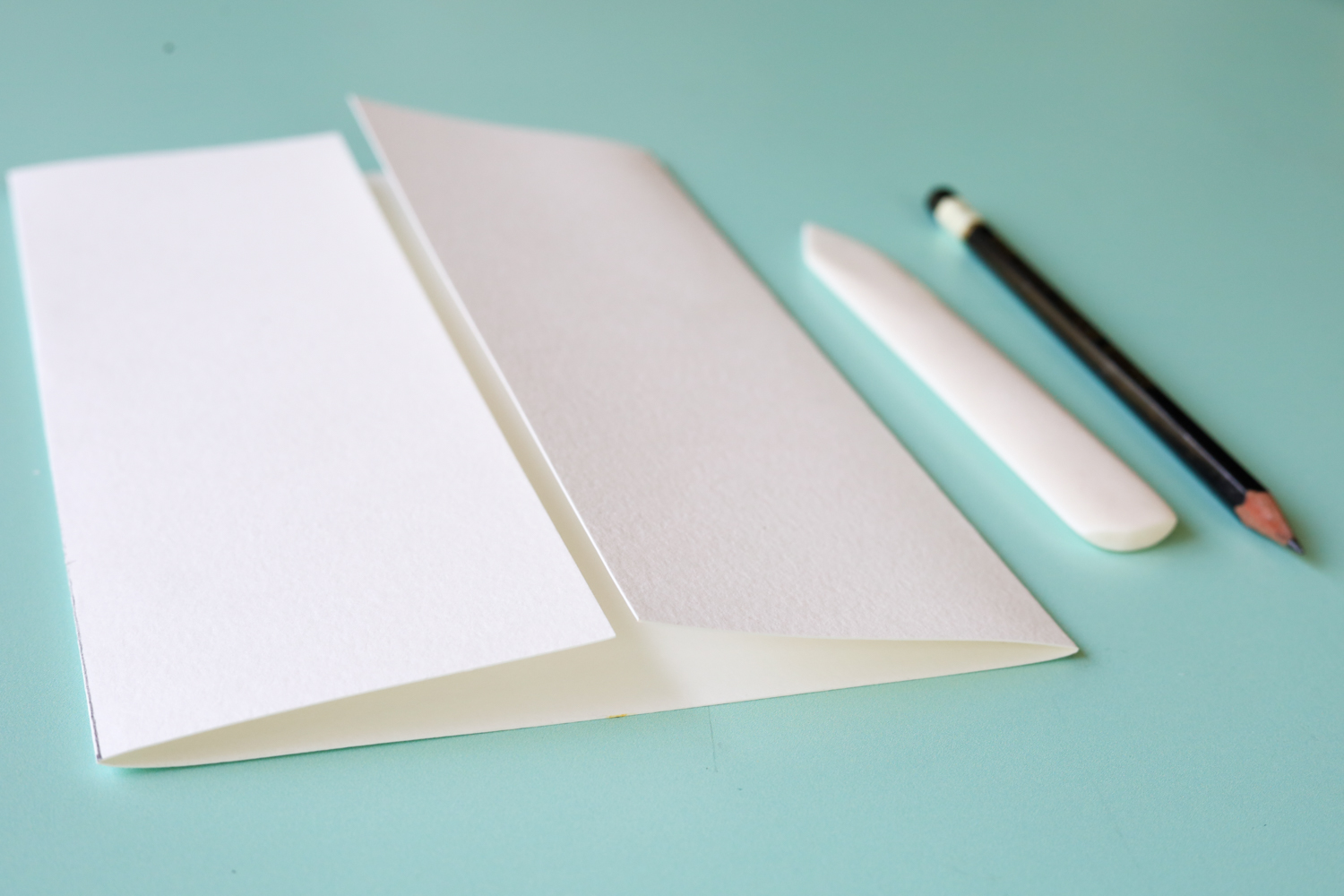 Fold in both 3" sections to create flaps.