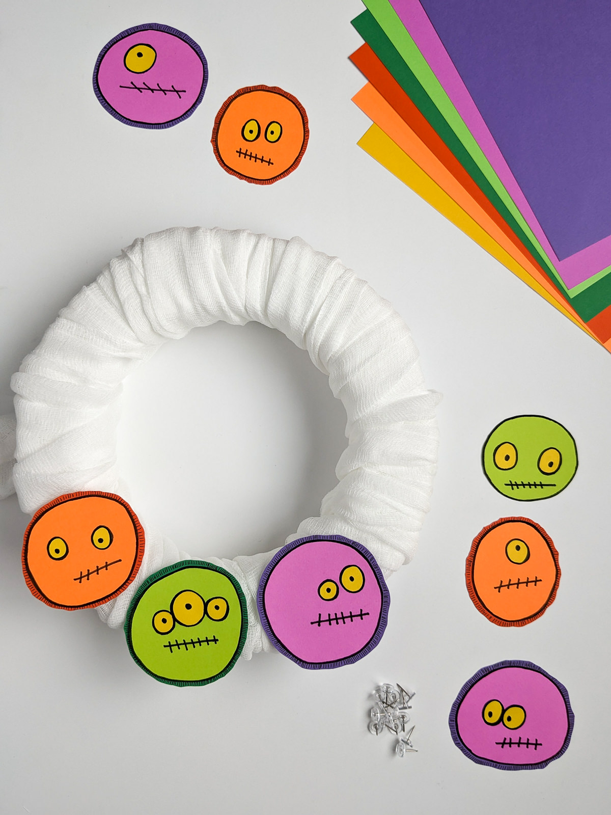 How to make a Halloween monster wreath | DIY Halloween Decorations Adding monsters to a DIY Halloween wreath covered in cheesecloth rather than tulle