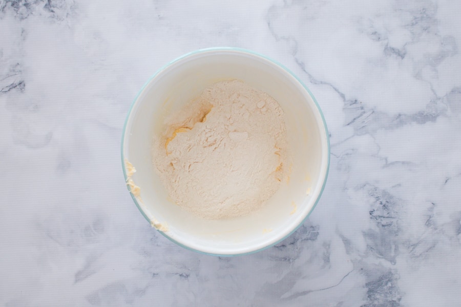 Shortbread made from 3 ingredients in a mixing bowl on a marble bench. 
