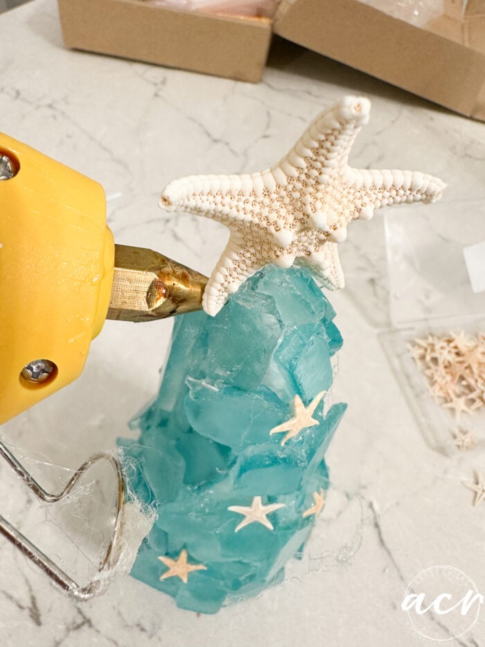 gluing the knobby starfish to the top