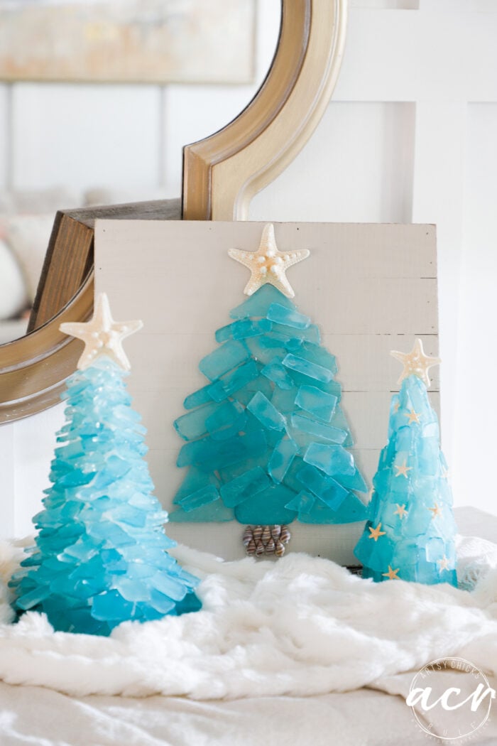 3 aqua sea glass christmas trees on fluffy white fabric