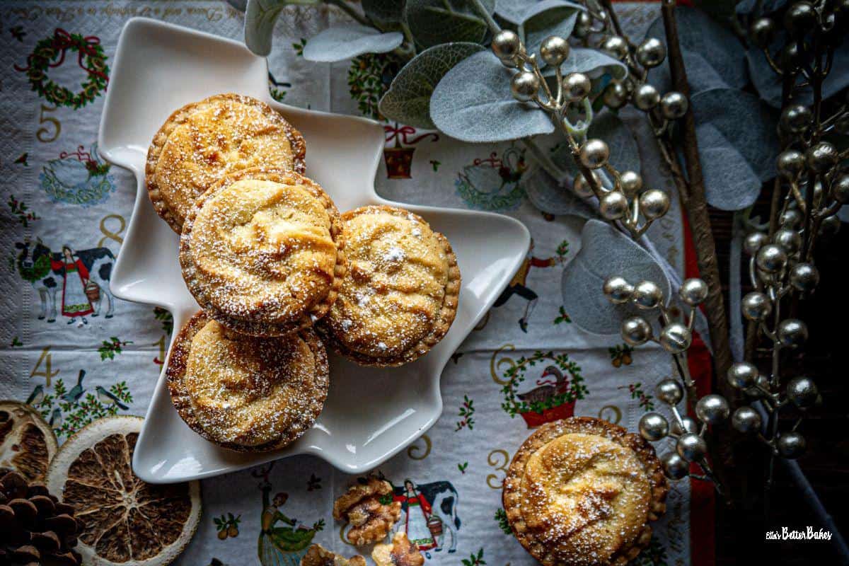 top shot of mince pies on a plate from a distance