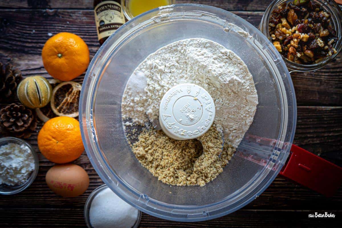 ground walnuts and flour in a food processor bowl