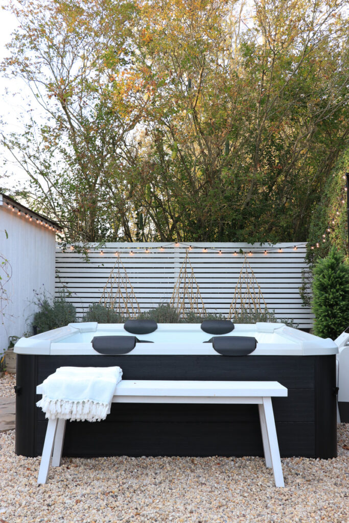 My New Portable Hot Tub the Oslo by Mspa. City Farmhouse by Jennifer O'Brien. Coastal backyard with white modern privacy screen.