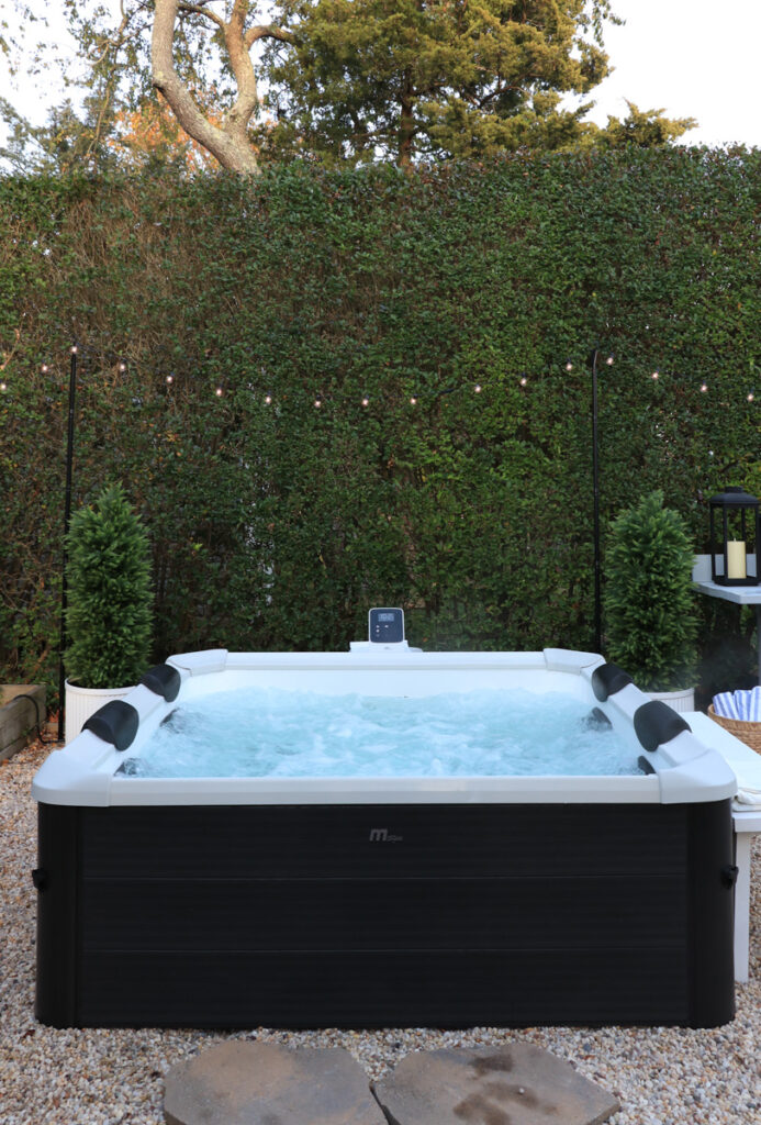 My New Portable Hot Tub the Oslo by Mspa. City Farmhouse by Jennifer O'Brien. Creating ambiance with string lights.
