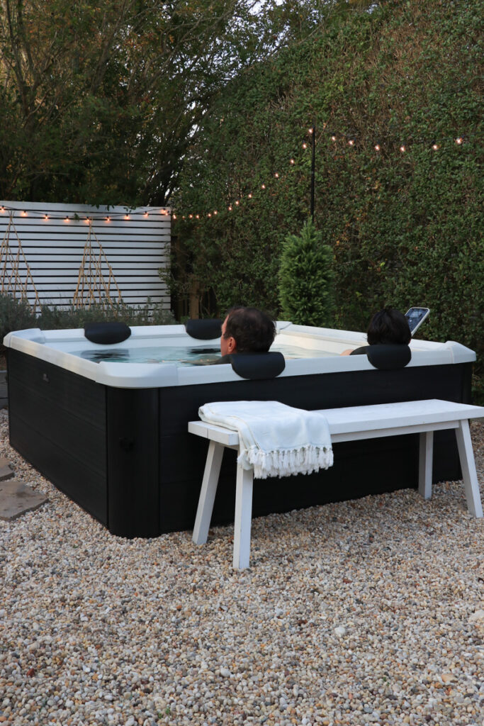 My New Portable Hot Tub the Oslo by Mspa. City Farmhouse by Jennifer O'Brien. Enjoying the hot tub.