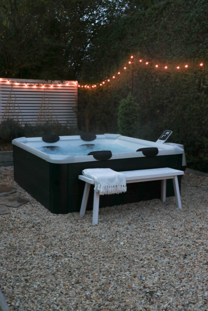 My New Portable Hot Tub the Oslo by Mspa. City Farmhouse by Jennifer O'Brien. Best string light stakes.