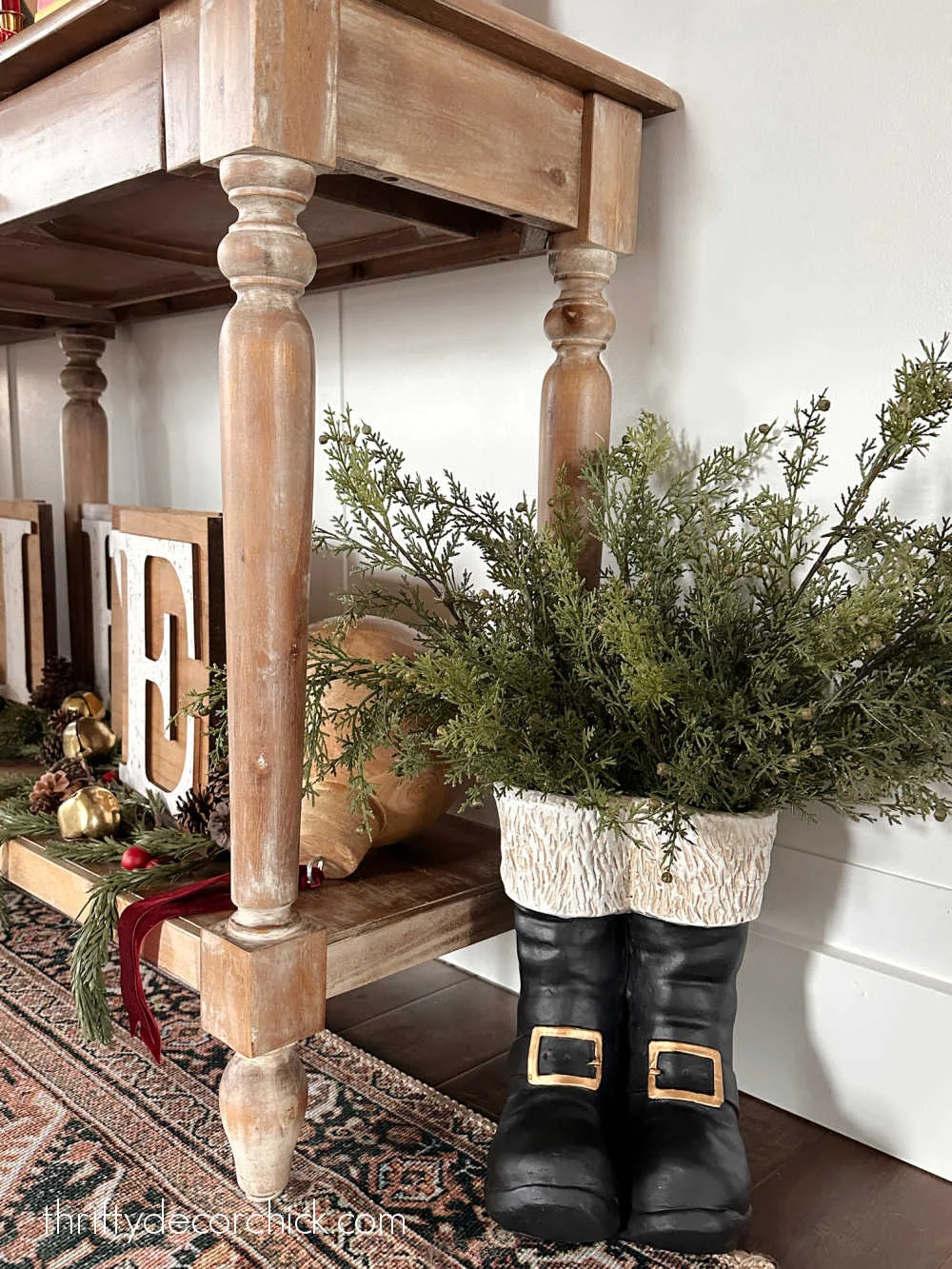 Santa boots with greenery