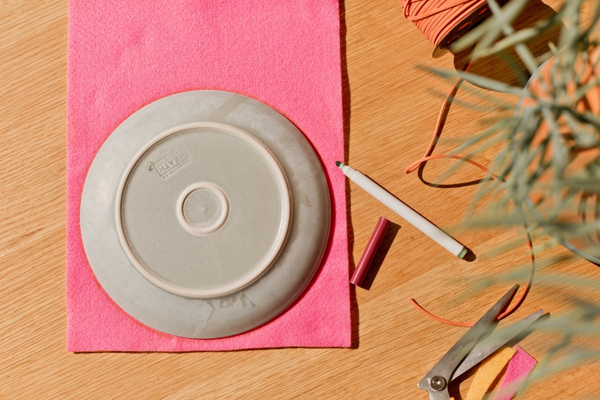 trace a plate or bowl onto felt to get a perfect circle