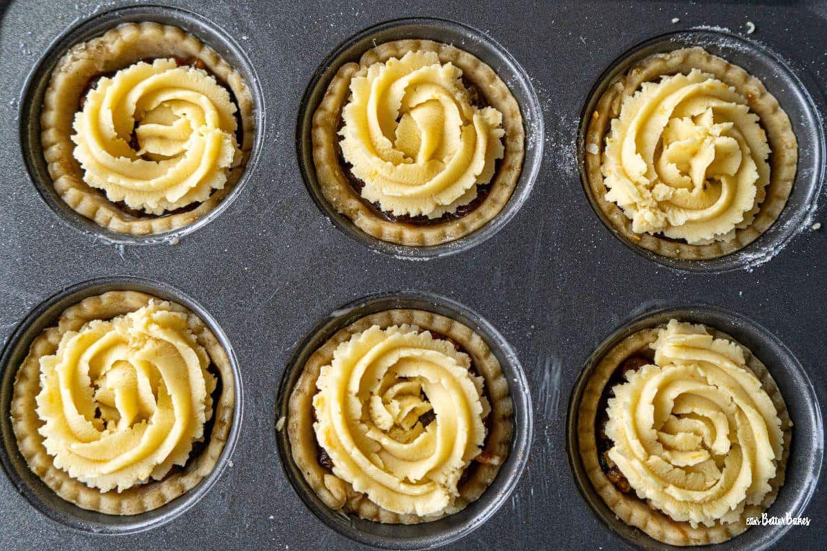 mince pies in a tin ready to bake