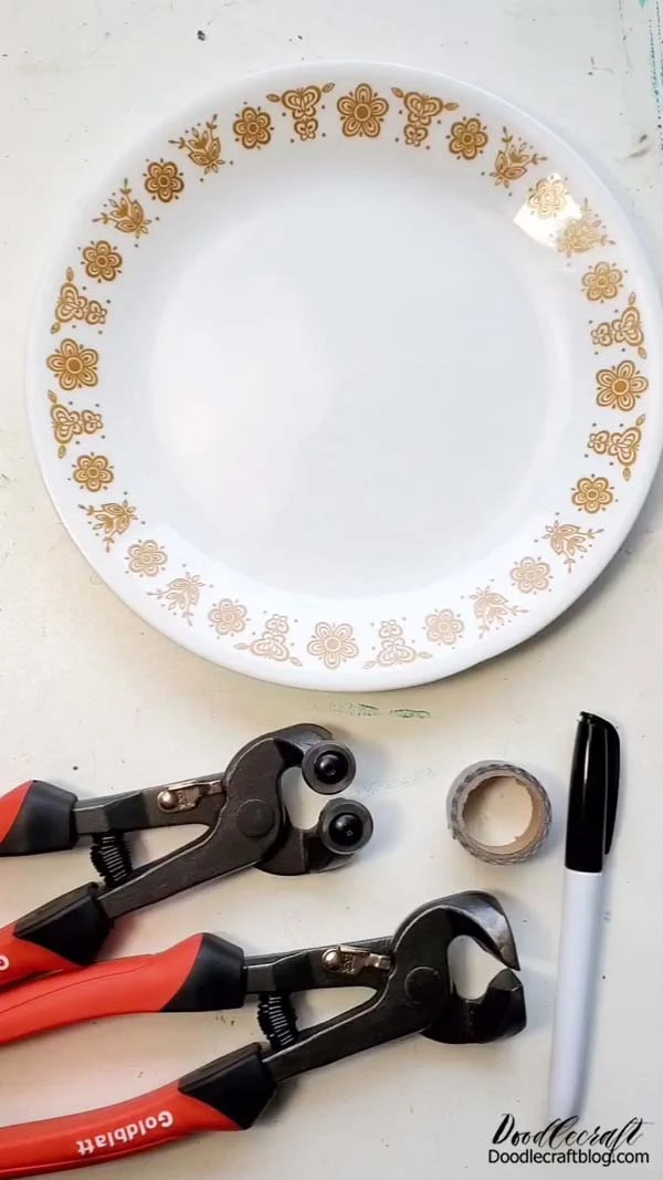 How to Make Corelle Plate Necklace Jewelry DIY! Supplies Needed for Corelle Plate Necklace Pendants: affiliate links Chipped Corelle Plate or other dishes (I found mine thrifting) Glass Tile Nippers and Tile Cutting Pliers Lead Free Solder Glass Grinding Machine Copper Foil Stained Glass Soldering Iron Heat Resistant Work Surface Pins Flux and Brush Jewelry Pliers Wire Steel Wool Safety Glasses Marker