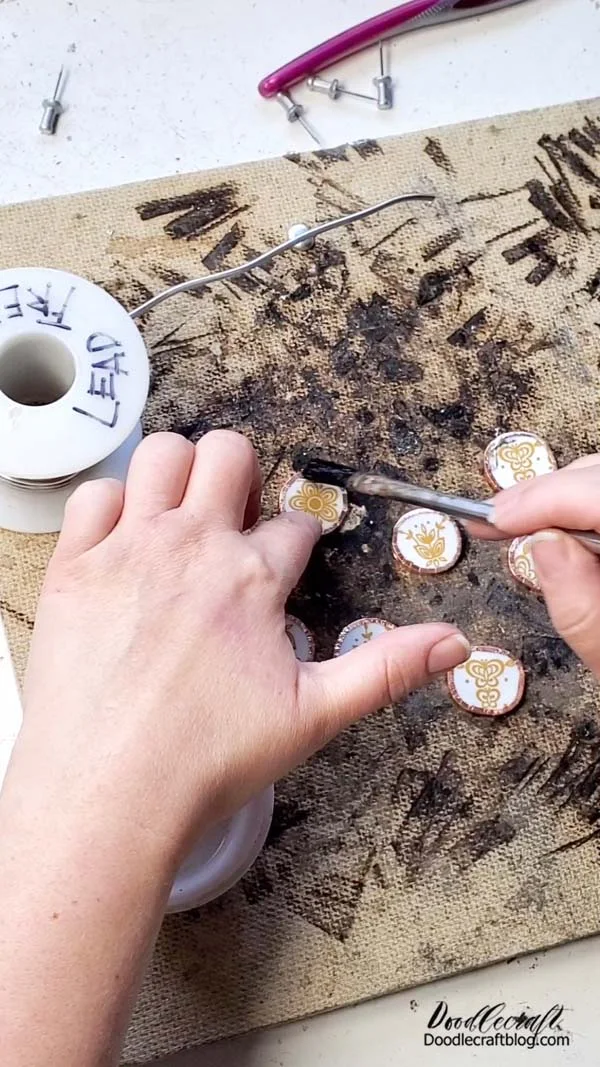 How to Make Corelle Plate Necklace Jewelry DIY! Step 5: Solder I recommend using LEAD FREE solder since these are designed to touch the skin. Begin by brushing some flux on the copper foil.